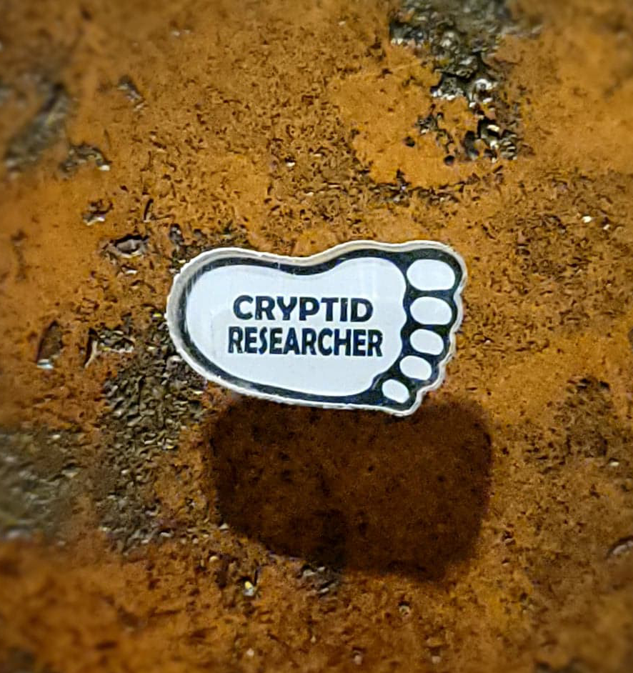 Cryptid Researcher Acrylic Pin cryptidcurosities