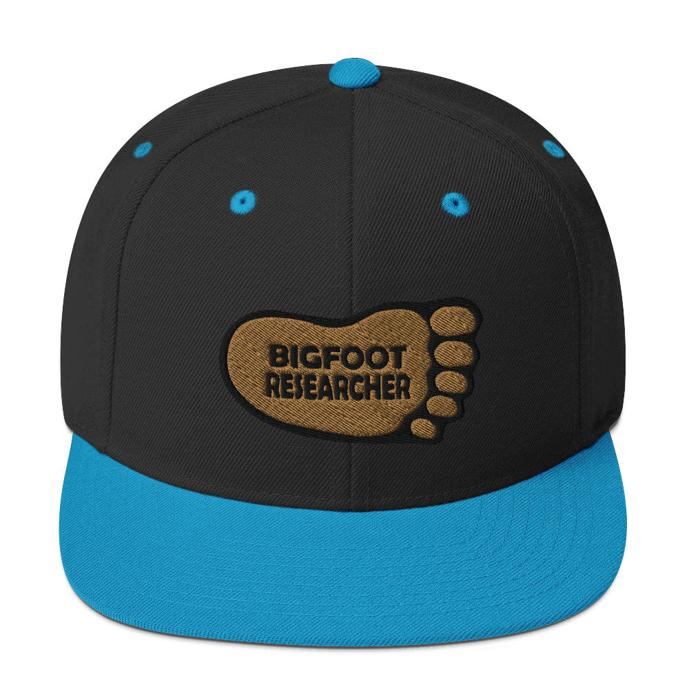 Black and Blue Bigfoot Researcher Snapback Hat cryptidcurosities