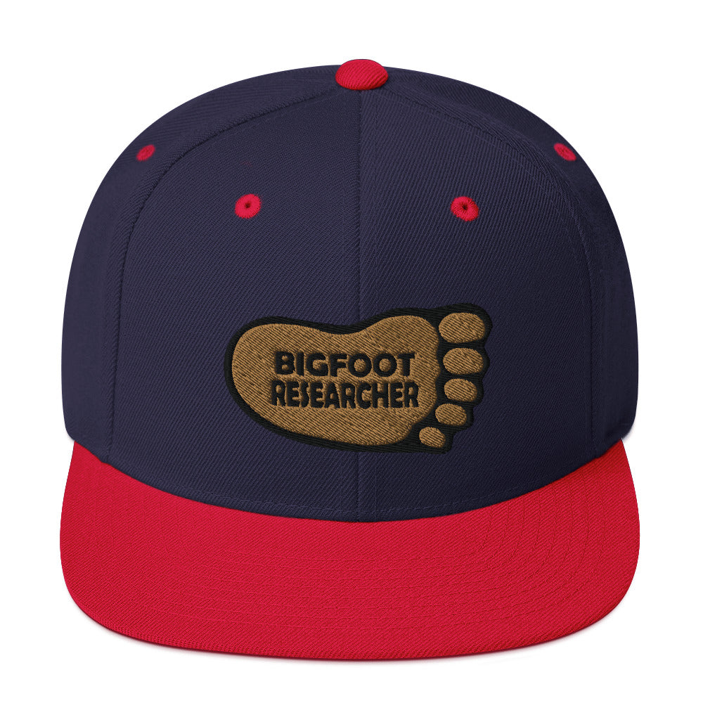 Red and Blue Bigfoot Researcher Snapback Hat cryptidcurosities