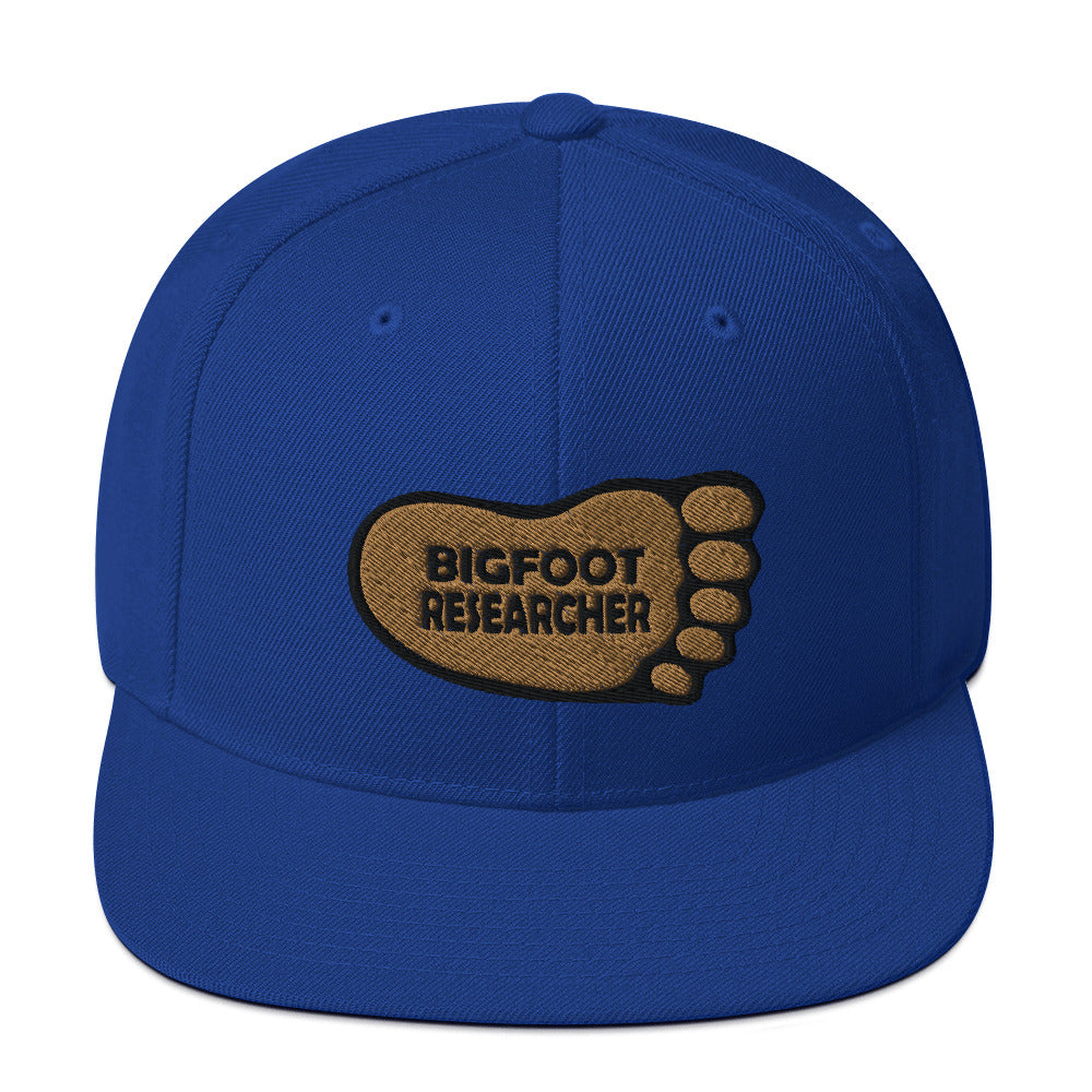 Bright Blue Bigfoot Researcher Snapback Hat cryptidcurosities