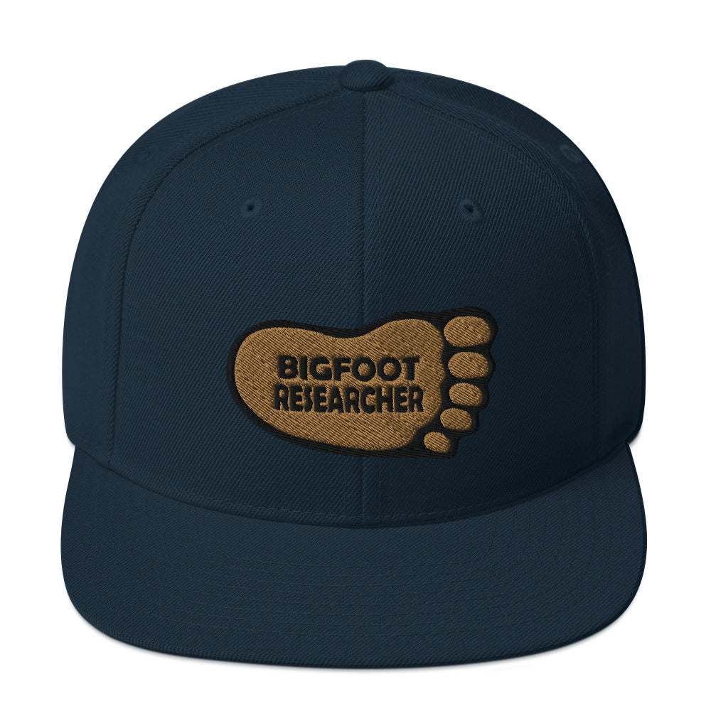 Navy Bigfoot Researcher Snapback Hat