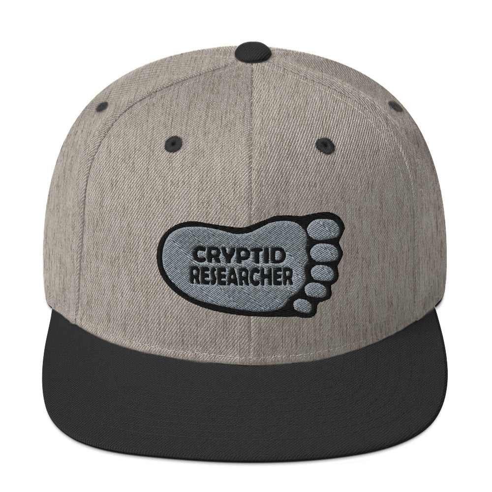 Heather Black Cryptid Researcher Snapback Hat cryptidcurosities