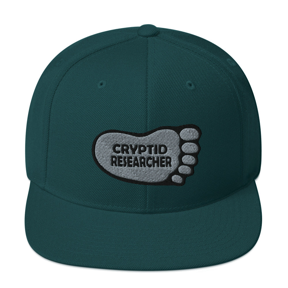 Spruce Cryptid Researcher Snapback Hat cryptidcurosities