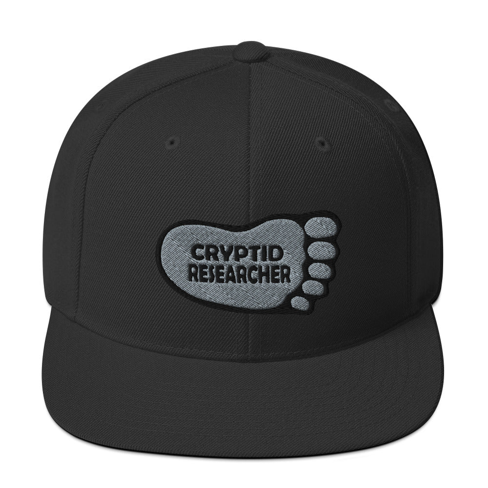 Black Cryptid Researcher Snapback Hat cryptidcurosities