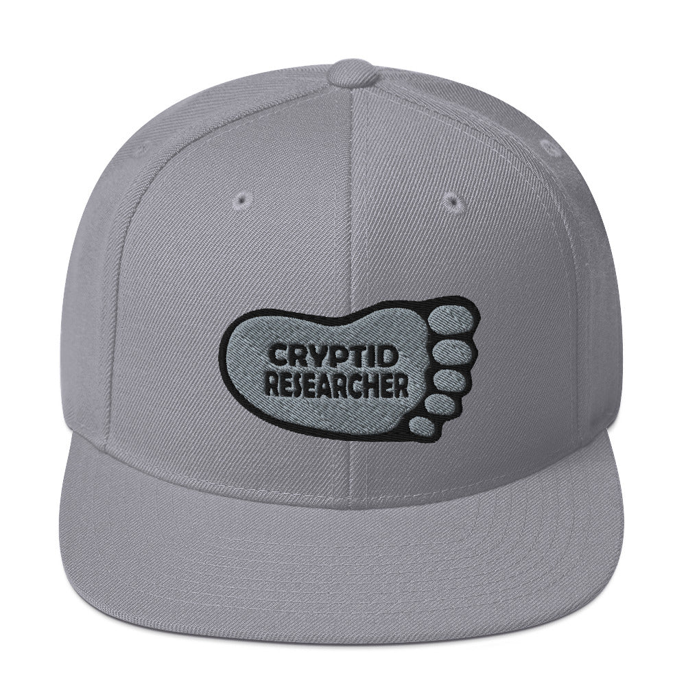 Silver Cryptid Researcher Snapback Hat cryptidcurosities