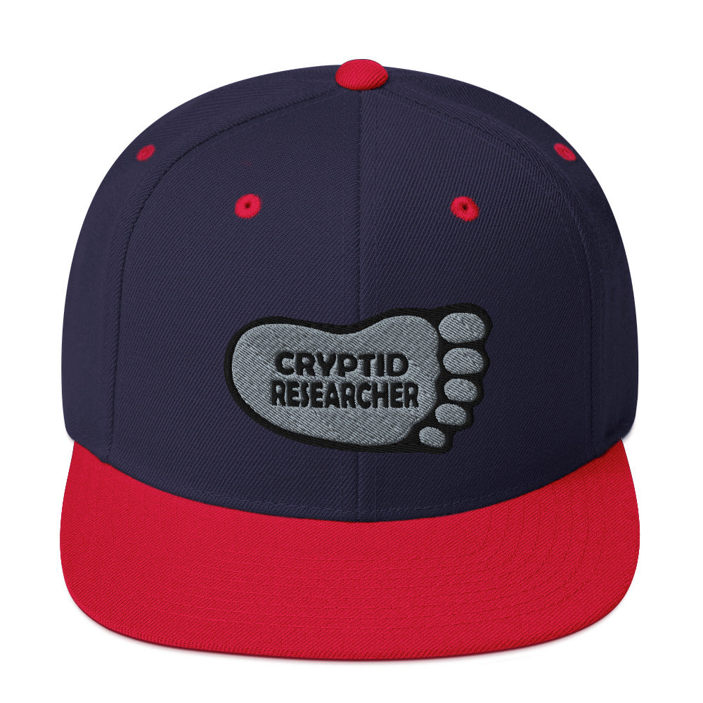Navy Red Cryptid Researcher Snapback Hat cryptidcurosities